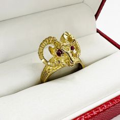 10k Solid Gold Bull Bighorn Sheep Red Eye Ring CZ for Men/Women * Metal : Real 10K Yellow Gold * Condition : Brand New * Finish : Polished * Width : 19.0mm * Height : 15.2mm * Weight : 6.9 gram * Processing time : 1~2 business days * Ships from California This is 100% Authentic 10k Gold. Not plated or filled. All of our items are brand new and are shipped with a gift box. Bighorn Sheep, Bull Design, Gold Rope Chains, Red Eye, Jewelry Statement, Eye Ring, Unique Animals, Red Eyes, Gifts For Nature Lovers