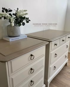 two white dressers side by side with flowers in a vase on the top and bottom