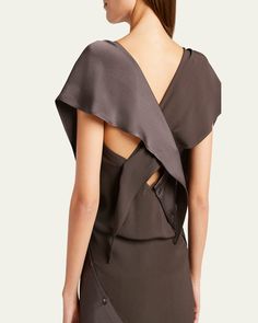 SETCHU origami dress 3 with button detail    May be styled in multiple ways    V neckline    Sleeveless    Midi length    Sheath silhouette    Viscose/acetate    Made in Italy Modern Sleeveless Silk Dress, Origami Dress, V Neckline, Button Detail, Midi Length, Origami, The Dress, Tops Designs, In Italy