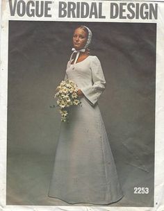 a woman in a white dress holding a bouquet of flowers on the cover of a magazine