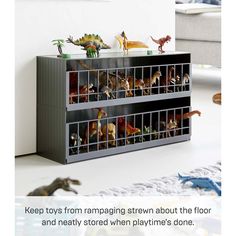 toy dinosaurs and other toys are placed on top of an entertainment center with text that reads, keep toys from tamping down about the floor and nearly stored when playtime's done