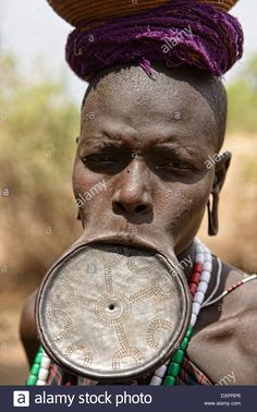 Download this stock image: Mursi woman with lip plate in the Lower Omo Valley of Ethiopia. - DXPRP6 from Alamy's library of millions of high resolution stock photos, illustrations and vectors. Lower Lip, Medical Illustration, Colour Images