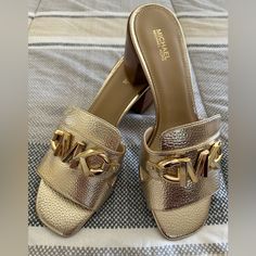 Michael Kors - Izzy Mule In Metallic Pale Gold. Comes With The Box. Michael Kors Chic Gold Heels, Chic Michael Kors Gold Heels, Chic Gold Michael Kors Heels, Michael Kors Shoes, Pale Gold, Mule Clogs, Gold Leather, Mules Shoes, Clogs