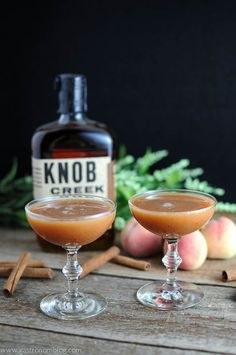 two glasses filled with an apple cider cocktail