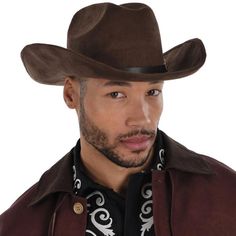 Elegant western wear? Yes indeed with this modern update to the cowboy hat. The faux suede accessory is a rich chocolate brown and has a simple black hatband with buckle detail. It's the perfect finishing touch to your dashing western look. pbDark Brown Faux Suede Modern Western Cowboy Hat product details:-b-p ul liAttached hatband with buckle detail-li liPolyester plastic and metal-li liDoes not include shirt or jacket-li liOne size fits most teens and adults-li -ul Brown Felt Hat For Western-themed Fall Events, Brown Western Felt Hat For Ranch, Adjustable Western Brown Costume Hats And Headpieces, Western Style Adjustable Brown Costume Hat, Western Fedora Costume Hat For Rodeo, Adjustable Brown Western Costume Hat, Western Fedora Hat For Rodeo, Western Fedora For Rodeo Costume, Western Costume Hats And Headpieces For Country Events