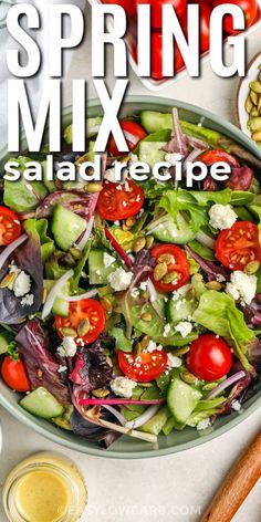 a salad with tomatoes, lettuce and feta cheese