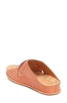 Crisscrossing vamp straps in smooth leather lend sophisticated style to this minimal slide sandal with contoured support and flexibility. Style Name:Kork-Ease Tutsi Slide Sandal (Women). Style Number: 6175087. Modern Slip-on Slides With Arch Support, Open Toe Slip-on Mules With Rubber Sole, Modern Slip-on Mules With Cork-bed Midsoles, Comfortable Open Toe Slippers With Cork-bed Midsoles, Leather Toe Loop Footbed Sandals With Arch Support, Slip-on Open Toe Mules With Rubber Sole, Leather Slides With Arch Support, Slip-on Open Toe Sandals With Arch Support, Open Toe Sandals With Arch Support