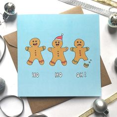 a card with three gingers on it and the words ho hoo written below