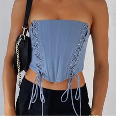 Blue Corset Top. Trendy Bandage Corset For Spring, Elegant Spring Bandage Corset, Fitted Bandage Corset Belt For Spring, Spring Fitted Bandage Corset Belt, Blue Cropped Corset For Spring, Blue Cropped Corset For Summer, Elegant Sleeveless Blue Corset, Sleeveless Blue Corset For Spring, Blue Overbust Corset For Spring