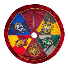 a multicolored harry potter spinner with hogwart's crests on it