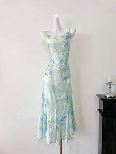 Bit by bit, let your style shine with this enchanting blue watercolor-inspired dress. The intricate print, reminiscent of serene summer skies, creates a calming yet captivating look. The dress features slender spaghetti straps and a fitted bodice, accentuating your figure while offering a comfortable and flattering fit. Made from lightweight, high-quality fabric, it ensures ease of movement and breathability, perfect for warm weather. The flared hem adds a touch of whimsy, making it ideal for ga Marble Print Dress, Summer Skies, Pink Ruffle Dress, Chiffon Summer Dress, Patterned Midi Dress, Unique Watercolor, Marble Print, Blue Marble, Pink Ruffle