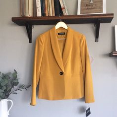 Sleek, Slimming, Never Worn. The Tag Says ‘Marigold’ It’s Like Mustard Yellow. Versatile Can Be Dressed Up For Work Or Dressed Down With Jeans And A Tank. Details: Single Dark Brown Button Faux Pockets Silk Lining Through Body And Sleeves Elegant Yellow Blazer For Semi-formal Occasions, Chic Gold Blazer For Semi-formal Occasions, Elegant Yellow Office Blazer, Tailored Gold Blazer With Lapel Collar, Gold Blazer For Office In Spring, Gold Spring Blazer For Office, Elegant Yellow Business Blazer, Elegant Yellow Blazer For Business, Tailored Gold Outerwear With Lapel Collar