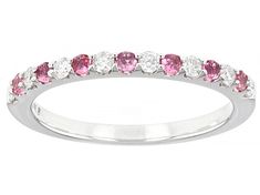 0.19ctw round pink tourmaline and 0.20ctw round white diamond, rhodium over 14k white gold October birthstone band ring. Measures approximately 7/8"L x 1/16"W and is sizeable. Pink Diamond Stackable Rings With Prong Setting, Pink Diamond Ring With Round Band In Fine Jewelry, Fine Jewelry Pink Diamond Ring With Round Band, Pink Diamond Round Band Jewelry, Pink Diamond Ring With Round Band, Pink Stackable Diamond Ring, Pink Stackable Diamond Ring In Fine Jewelry Style, Pink Diamond Ring With Single Cut Diamonds, Pink Round Cut Single Diamond Jewelry