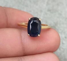 "Natural Blue Sapphire (Neelam) Gemstone Ring/Astrology purpose panchdhatu ring for men's and women's Product  : Ring Gemstone : Blue Sapphire (Neelam) Stone Size :  3.70 ct- 10 ct. (4 to 11 Ratti) Metal : Panch Dhatu Natural Certified Blue Sapphire/ Neelam Silver Astrology Ring For Men And Women . The product in display is a Gemstone and it is finished in an attractive Blue color. The Blue Sapphire Gemstones popularly known as Neelam is the stone of Saturn (Shani) and is widely known for its po Handmade Oval Sapphire Ring In 14k Gold, Minimalist Oval Sapphire Ring In 14k Gold, Ring Astrology, Astrology Ring, Flat Rings, Neelam Stone, Stone Ring Design, Oval Sapphire Ring, Tattoo Script