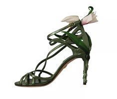 DOLCE & GABBANA Gorgeous brand new with tags, 100% Authentic Dolce & Gabbana strappy heels sandals with floral applique. Model: Heels sandals Color: Acid Green Material: 100% Leather Sole: Leather Logo details Very high quality and comfort Made in Italy This item has a minor defect, it has a scratch all over the shoes (see pictures for details). Luxury Spring Heels With Wrapped Heel, Luxury Heels With Wrapped Heel For Spring, Luxury Ankle Strap Heels For Spring, Luxury Spring Cocktail Heels, Designer Green Formal Sandals, Designer Strap Sandals For Party, Designer Party Sandals With Strap, Designer Strap Sandals For Formal Occasions, Designer Green Ankle Strap Heels