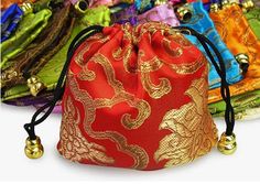 Really pretty silk brocade drawstring pouch for you to keep that precious rosary or piece of jewellery in The pouch is lined and measures 110mm x 110mm Vibrant colours  PLEASE MAKE SURE YOUR SHIPPING ADDRESS IS CORRECT  If you are purchasing the listing as a gift I can send direct to the recipient for you if you enter the address in "the note to seller" box before checkout Only one address per transaction  I ship to the shipping address listed on your Etsy account. I am not responsible for order Gold Embroidered Pouch For Gift, Red Potli Bag For Festivals And Gifts, Red Coin Purse Pouch For Gift, Red Pouch Coin Purse As Gift, Red Pouch Coin Purse For Gift, Traditional Rectangular Coin Purse For Gift, Handmade Gold Coin Purse For Gift, Traditional Rectangular Coin Purse As Gift, Festival Potli Pouch Bag Gift