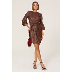 Brown faux leather (88% Polyester, 12% Polyurethane). Hourglass. Crew neck. Three quarter sleeves. Side zipper closure. 36" from shoulder to hemline. Made in USA of imported materials. Trendy Leather Dresses, Leather Knee-length Mini Dress For Date Night, Trendy Faux Leather Mini Dress For Fall, Faux Leather Knee-length Fall Dresses, Faux Leather Knee-length Dresses For Fall, Fall Faux Leather Knee-length Dress, Fall Faux Leather Mini Dress For Date Night, Faux Leather Mini Dress For Date Night In Fall, Faux Leather Mini Dress For Work