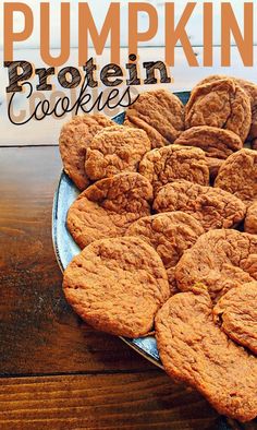 pumpkin protein cookies on a plate with text overlay