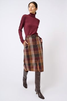 A trouser skirt like no other, our Italian patchwork fabric makes this the show stopper of the season. With a zip front closure and center front slit, this style can be paired with our Patch Pocket Blazer or worn with your favorite sweater.ESTIMATED DELIVERY 9/30/22 1.5" waistband, clean finish zip front closure with hook and bar, front slant pockets, center front slit, belt loops, back darts, fully lined. - 100% Virgin WoolFabric woven in Italy - Made in NYC - Dry clean only - Our model is 5'9. Checkered Skirt Outfit, Nyc Fashion Winter, Trouser Skirt, Capsule Wardrobe Pieces, Chic Business Casual, Checkered Skirt, Business Casual Outfits For Women, Fashion Business Casual, 1980s Fashion