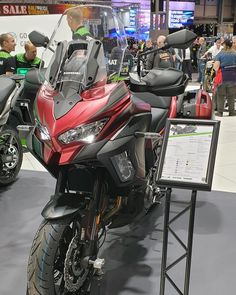 the motorcycle is on display at the show