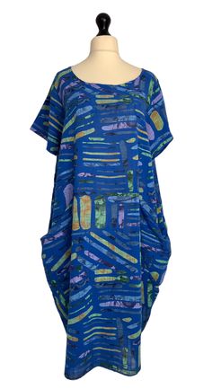 . Made from 100% cotton in a vibrant quirky stripe pattern , loose fitting shift dress style with short sleeves and 2 side hip pockets . One size - to fit UK sizes 14 16 18 20 . Bust measures : 48 inches . Length from back of neck to bottom hem : 40 inches . Brand new with tags . Visit our shop for lots more gorgeous quirky lagenlook fashion !! Blue Oversized Short Sleeve Dress, Oversized Blue Short Sleeve Dress, Striped Short Sleeve Dresses With Pockets, Blue Short Sleeve Dress With Side Pockets, Blue Short Sleeve Lagenlook Dress, Blue Cotton Dress With Side Pockets, Shift Dress Styles, Lagenlook Style, Couture Mode