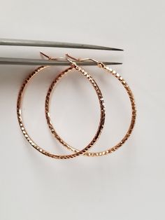 "Thanks for shopping our vintage estate store. We tend to sell well below wholesale and truly hope you enjoy all of our items. Many of the items are one of a kind, so please enjoy scrolling through the pictures and hopefully something will catch your eye. Brown spots are from camera or reflections. Beautiful estate 14k rose gold medium to large hoops. Bought out a jewelry store that was closing and these were in their inventory. Look new. Length: 1.5\" 40mm Width: 1.5\" Thickness: 2mm 1/8\" Weig Beach Rings, Gold Hamsa, Hoops Earrings, Earrings Hoop, Brown Spots, Diamond Rings Bands, Diamond Eternity, Cz Diamond, Jewelry Earrings Hoops