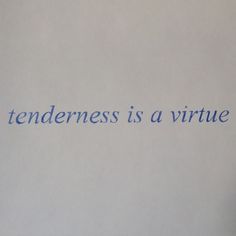 a hand holding a cell phone with the words tenderness is a virtue written on it