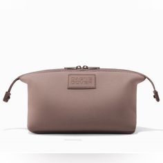 Dagne Dover Hunter Neoprene Toiletry Bag In Dune, Size Large Makeup Bag, Cosmetic Bag Neoprene: Dune - A Muted Mauve With Brown Undertones Why We Love It This Hunter Organizes All Your Grooming Essentials, With: Room For Lots Of Toiletries Water Resistant Neoprene Material Removable Air Mesh Zip-Top Pouch Repreve Recycled Polyester Dust Bag 100% Vegan What's Included Air Mesh Zip Top Pouch Air Mesh Brush Pouch Dimensions Size: 9” L X 4.75” W X 5.5” H Volume: 3 L Weight: 7 Oz Trendy Nylon Rectangular Cosmetic Bag, Trendy Nylon Pouch Cosmetic Bag, Everyday Rectangular Nylon Cosmetic Bag, Trendy Cosmetic Bag With Removable Pouch For On-the-go Use, Dagne Dover Toiletry Bag, Dagne Dover, Large Makeup Bag, Toiletry Bag, Cosmetic Bag