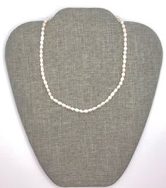 This necklace is a perfect everyday staple piece. It is perfect for any outfit and it can be dressed up or down. It is made from freshwater pearls accented with gold colored clasps. The size of the beads are 3mm. The standard size for the necklace is 16 inches from the clasp to the last link of the extender. If you would like to request a certain size, please message me. : ) Everyday Single Strand Round Necklace, Everyday White Necklace With Lobster Clasp, Everyday Round Single Strand Necklace, Classic Everyday Hypoallergenic Necklace, Classic White Hypoallergenic Necklace, Pearl Trend, Planet Necklace, Freshwater Pearl Necklace, Wire Wrapped Rings