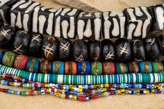 Loving these Mixed Kente Krobo Beads! Which strand do you like the most from this picture? #Krobo #Kente #VinylBeads #TheBeadChest #EthicallySourced #AfricanBeads #Jewelry #UpcycledJewelry #BoneBeads #DIY #DIYJewelry #DIYDecor #EtsyStore #EtsyJewelry #JewelryDesigner #InteriorDesigner #HomeDeocr #DIYDesign #JewelryBlogger #NecklaceMaker Multicolor Round Wooden Beads, Multicolor Oval Wooden Beads, Colorful Polished Round Beads, Krobo Beads, Bone Beads, African Beads, Upcycled Jewelry, Etsy Jewelry, Diy Design