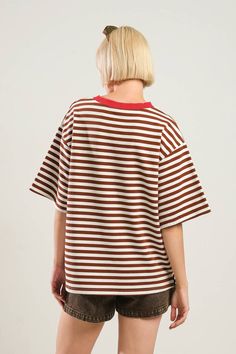 A striped knit top with round neckline and short sleeveDetails:Self : 95% Cotton 5% SpandexContrast : 65% Cotton 30% Polyester 5% SpandexSize & Fit- Model is 5`8" And Wearing Size Small- Measurements Taken From Size Small- Approx. Length: 26.5" Trendy Crew Neck T-shirt With Vertical Stripes, Trendy T-shirt With Vertical Stripes And Crew Neck, Striped Ribbed Short Sleeve Tops, Striped Ribbed Crew Neck T-shirt, Kimono Sweater, Keep It Cool, Swimsuit Cover, Sweatshirt Dress, Sleeve Detail