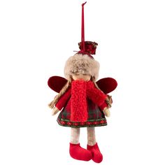 a christmas angel ornament hanging from a red ribbon on a white background in the shape of a doll