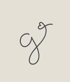 the letter g is inscribed in black ink on a light gray background with an arrow