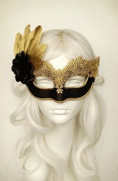 Venetian style black and gold masquerade ball mask covered with black satin. Embellished with gold lace, braided trim, black beads, black satin rose and gold feathers. Your order will be delivered with online tracking by DHL or UPS. Back surface is also covered with fabric for comfortable Black Full Face Masquerade Accessories, Black Full Face Carnival Masks, Gold Venetian Mask For Halloween, Black Full Face Masquerade Costume Accessories, Gold Eye Mask For Halloween Masquerade, Venetian Gold Masquerade Mask For Halloween, Gold Venetian Masquerade Mask For Halloween, Full Face Black Masquerade Mask For Costume Party, Gold Eye Mask For Costume Party