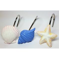 three starfish, sea shell and seashell shaped hooks