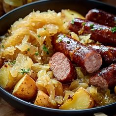 some sausages and potatoes are in a bowl