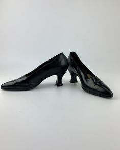 "1920's Black Leather Spool Heel Shoes. Quality leather, Fine leather and cloth interior in the toe area, fine leather in the heel and side areas of the interior.. Super Pointy toe. Rather narrow, as most shoes are from this period. This is a RARE FIND, Collectable for their age, quality and condition! The soles and heels show no wear. These shoes are in EXCELLENT VINTAGE CONDITION... with a few very minor scratches and a few hairline cracks.. nothing crazy.. The leather has been treated and is Classic Evening Slip-on Court Shoes, Fitted Vintage Heels With Heel Tab, Fitted Leather Shoes With Low Heel And Leather Sole, Classic Fitted Leather Shoes With Low Heel, Fitted Court Shoes With Round Toe For Galas, Galas Court Shoes With Round Toe, Classic Leather Shoes With Round Toe For Evening, Classic Round Toe Leather Shoes For Evening, Classic Fitted Court Shoes With Leather Sole