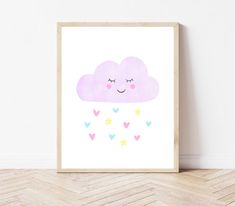 a pink cloud with hearts and stars on it is in the corner of a room