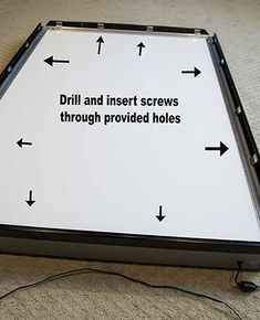 a black and white box with instructions on how to use the drill and insert screws through provided holes