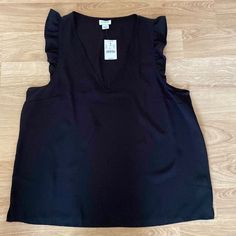 Sleek And Lightweight Blouse From J. Crew. Ruffled At Shoulder. V-Neck. Chest: 20” Length: 25” Size: 14 New With Tags Elegant Sleeveless V-neck Top For Work, Black V-neck Vest For Night Out, Fitted Sleeveless V-neck Top For Work, Chic V-neck Vest For Night Out, V-neck Tank Top For Work, Chic V-neck Blouse, V-neck Vest Top For Workwear, V-neck Vest Top For Work, Black Tank Blouse For Workwear