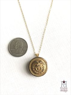 This military button necklace bears a vintage US Coast Guard (USCG) uniform button centerpiece. This gold-tone setting is strung on a 14K Gold Filled, 18-inch chain with c-clasp. This military jewelry makes the perfect military gift for any coastie, their wife, mom, or girlfriend. This piece was hand-crafted by a military spouse at Hope Design Ltd., reinventing military heraldry in a modern, fashionable way. Military Jewelry, Dandelion Necklace, Military Gift, Hope Design, Military Kids, Button Necklace, Us Coast Guard, Military Spouse, Military Gifts