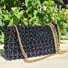 This is a unique handmade crystal beaded bag as an elegant finish for your look. Fits a phone and additional handy things you may night on a night out. Made of glass beads. Evening Clutch Phone Bag With Chain Strap, Evening Phone Clutch With Chain Strap, Elegant Phone Bag With Chain Strap, Elegant Rectangular Phone Bag With Chain Strap, Chic Evening Clutch Phone Bag, Chic Evening Phone Clutch Bag, Glamorous Beaded Clutch As Gift, Luxury Evening Clutch Phone Bag, Black Rectangular Phone Bag For Party