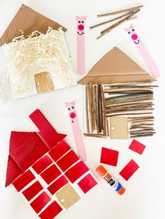 the paper houses are cut out and ready to be made