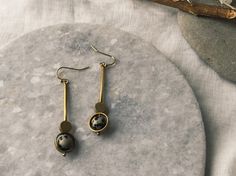 Everyday genuine brass with natural stone drop earrings.  Roughly 2 inches length. Stone Drop Earrings, Dalmatian Jasper, Dalmatian, Belly Button Rings, Natural Stone, Natural Stones, Jewelry Earrings Dangle, Dangle Drop Earrings, Dangle Earrings