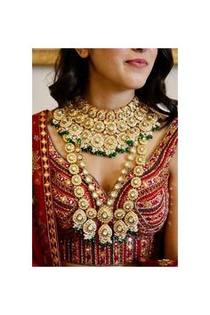 Full bridal Kundan set to enhance your beauty! Saying your vows and taking blessings from your dear ones on your special day! Make your wedding a little more special in our designer bridal set! Trendy, eye catching  choker and long necklace set is handcrafted with shimmering kundan stones, interlaced with pink and mintgreen beads.  The complete bridal set comprises of 9 pcs including a long necklace, a princess necklace, pair of beautiful jhumka earrings with kaan chains, a mathapatti, an armlet Traditional Zari Work Sets For Marriage, Elegant Kundan Bridal Sets For Traditional Ceremonies, Gold Bridal Sets With Pallu For Traditional Ceremonies, Kundan Bridal Accessories With Tilla For Marriage, Gold Sets With Pallu For Marriage, Gold Bollywood Lehenga For Marriage, Gold Dupatta With Intricate Design For Wedding, Bollywood Style Gold Lehenga For Marriage, Traditional Cutdana Dupatta For Marriage