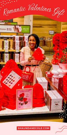 a woman standing in front of a display of valentine's gifts