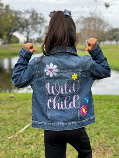 Custom Embroidered Denim Name Jacket with flowers Flowers will be in fun different colors, similar to pictured. If you want specific flower colors, let me know in the notes.  These are Carter's dark denim jackets.  100% Cotton  2T 3T 4T 5T 6, 6X Drop down says 6x but the size is 6, 6x 7 8 10 12 Please refer to their size chart for measuremts before ordering, but they run pretty true to size. Lots more thread color options, so if looking for something specific, let me know! Select thread color for NAME:  *Pictured in sweet lavender. Bubble Gum Cotton Candy Christmas Green Christmas Red Dusty Mauve Gold Guacamole Summer Yellow Sweet Lavender Tukan Blue White CUSTOMIZATION  Please leave the name of the child or the word you want stitched on the back, on the personalization area provided. Plea Baby Denim Jacket, Custom Jean, Custom Jean Jacket, Dark Denim Jacket, Custom Denim Jacket, Jean Jacket For Girls, Flower Colors, Dusty Mauve, Custom Jeans