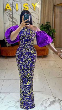 A gown is a formal dress. When your date to a party or dance is wearing a tuxedo, you'll probably want to wear a gown. There are many different kinds of gowns, including ball gowns, and wedding gowns Ankra Girls Dresses, African Formal Dress, Dresses Ankara, African Gowns, Styles Ankara, Nigerian Lace Styles, Ankara Gowns