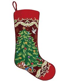 a red christmas stocking with a green tree on it