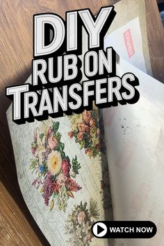 a wooden table topped with lots of papers next to a sign that says diy rubon transferers